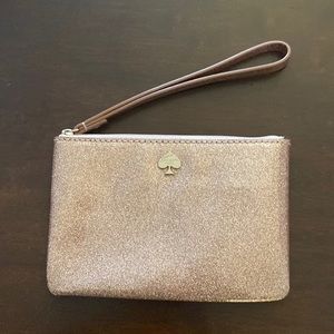 Kate space gold wristlet